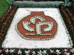 logo ÚEB, ztvárněné naším zahradníkem Františkem Jakoubkem